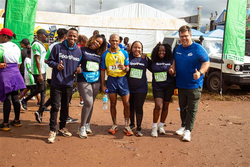 John April and the SportPesa team after the 2026 Kilimanjaro Marathon